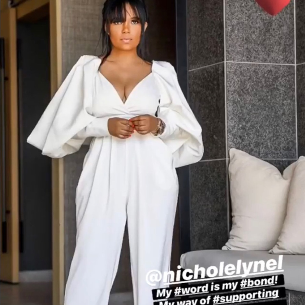 New White jumpsuit with pockets and detachable long sleeves with side Skita